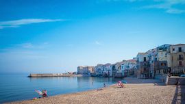 Cefalu - A morning at the beach with view of the old town