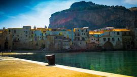 Cefalu - View of the old city from the pier of the old harbour