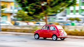 A Fiat 500 racing by in Bagheria