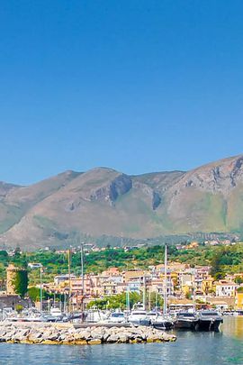 A view of the marina of San Nicola l'Arena taken from the sea